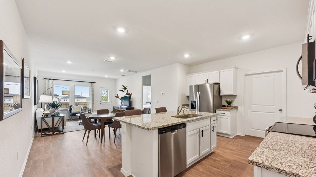 Furnished interior in a model home at Palomino in Manor (Image 6).