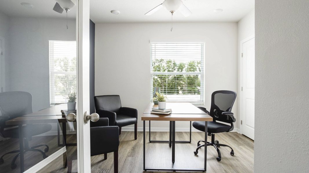 Furnished interior in a model home at Village Oaks in Clearwater (Image 10).