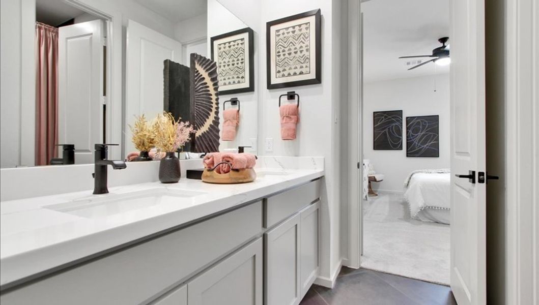 Furnished interior in a model home at Canterra Creek  60' in Iowa Colony (Image 23).