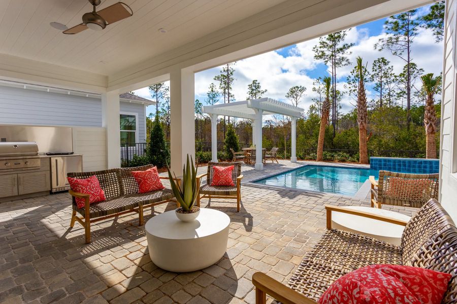 The Orchid Model features a Covered Lanai and Summer Kitchen.