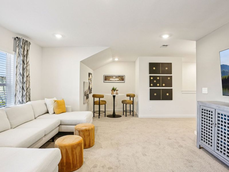 Furnished interior in a model home at Greystone - Vista Townhomes in Smyrna (Image 10).