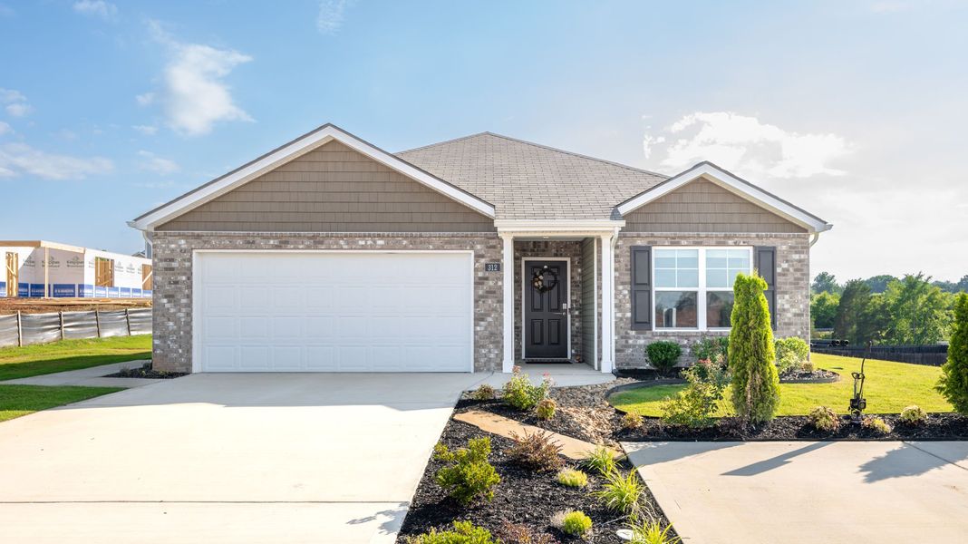 Front exterior of a home in the Crescent Ridge community, located in Niota, TN (Image 2).