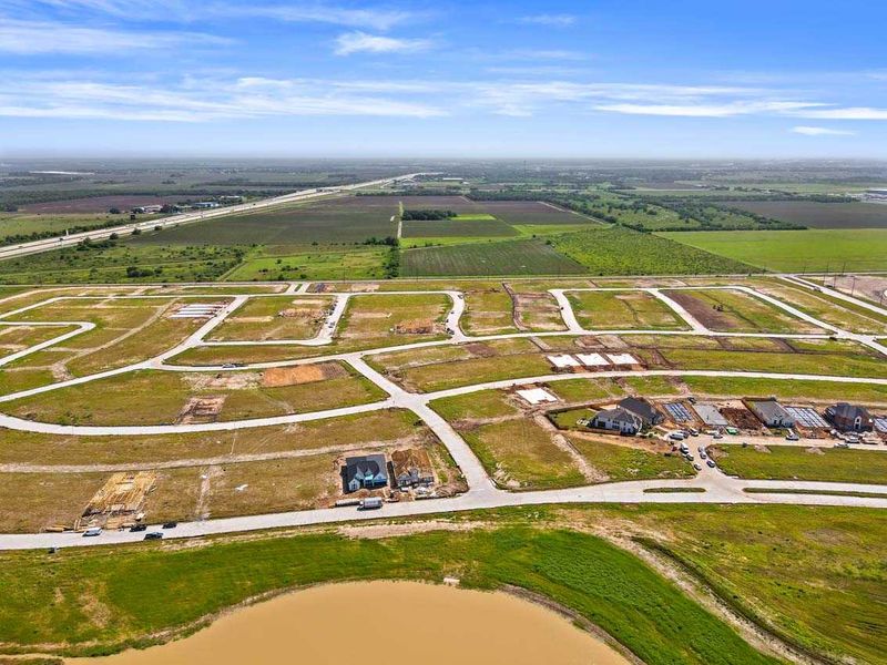 Aerial view of the Brookewater community in Rosenberg, TX, showing layout and nearby surroundings (Image 14).
