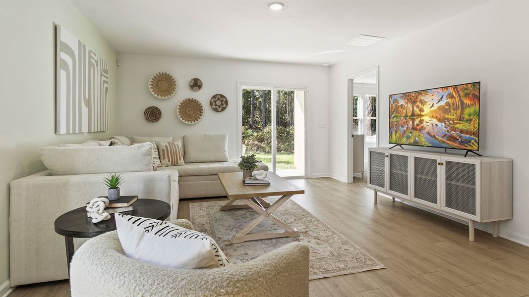 Furnished interior in a model home at Copes Landing in Jacksonville (Image 52).