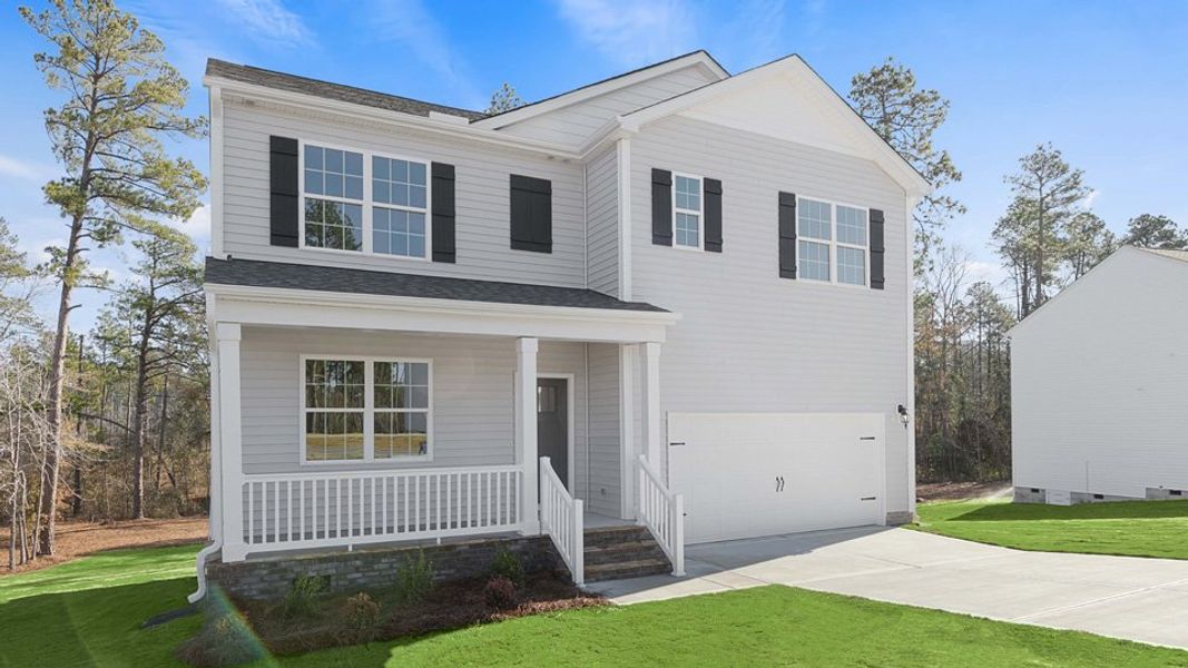 Front exterior of a home in the Gretchen Pines community, located in West End, NC (Image 18). Front exterior of a home in the Gretchen Pines community, located in West End, NC (Image 18).