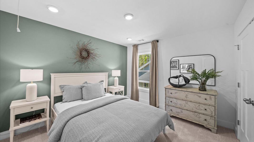 Memorable space with walk-in closet, soft carpeting, and striking natural light from large windows Memorable space with walk-in closet, soft carpeting, and striking natural light from large windows