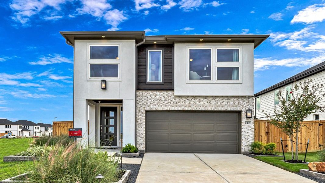 Front exterior of a home in the Avalon at Cypress community, located in Cypress, TX (Image 3).