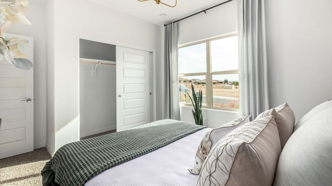 Furnished interior in a model home at Entrada Del Toro at Rancho Sahuarita in Sahuarita (Image 33).