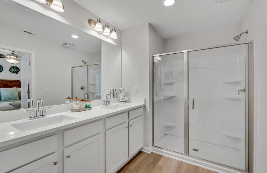 Furnished interior in a model home at Waypoint Townhomes in Panama City Beach (Image 8).