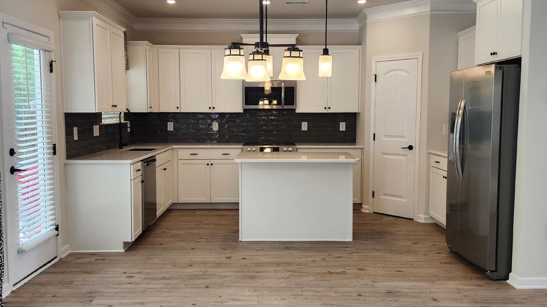 Furnished interior in a model home at Lexington Woods South in Fayetteville (Image 5).