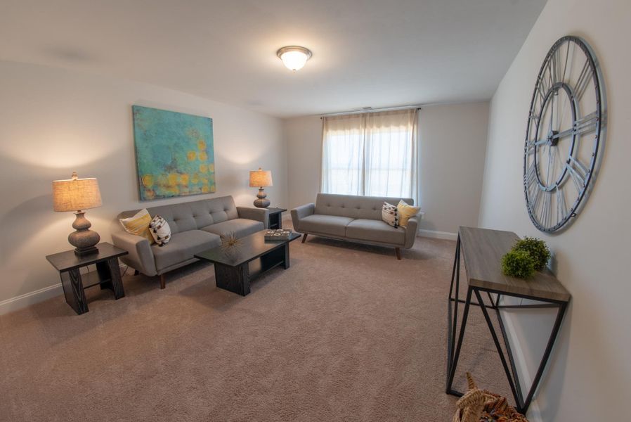 Furnished interior in a model home at Hidden Lake Preserve in Greenville (Image 12).