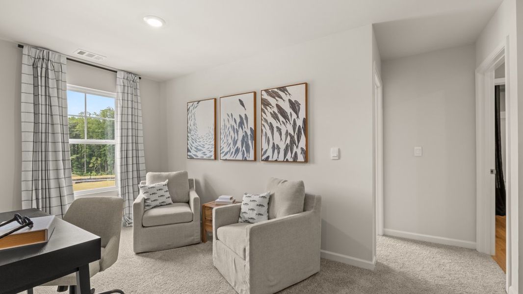 Furnished interior in a model home at Grandview at Lanier in Dawsonville (Image 19).