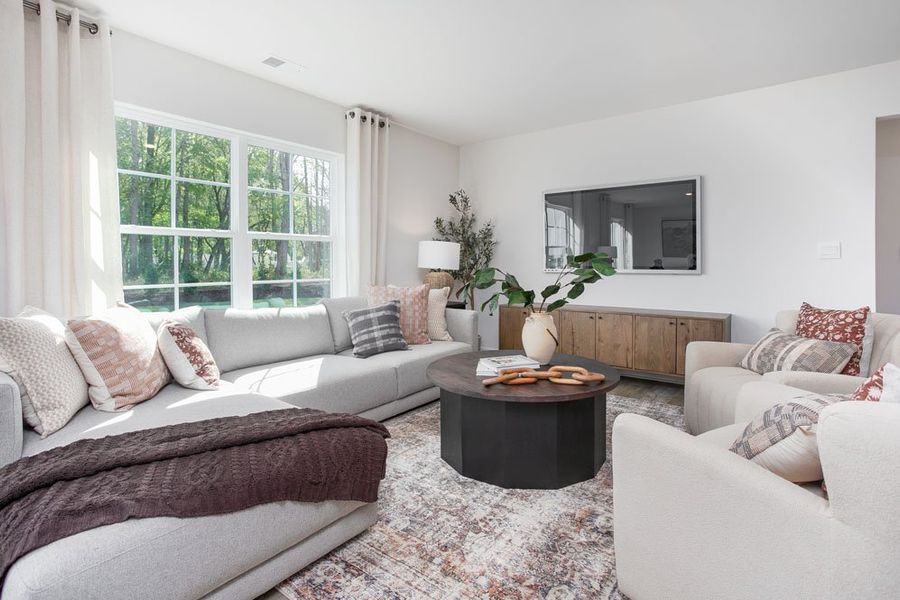 Furnished interior in a model home at Collett Farm in Trinity (Image 40).