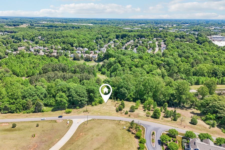 Aerial view of the Trillium Reserve at Lake Norman community in Mooresville, NC, showing layout and nearby surroundings (Image 9). Aerial view of the Trillium Reserve at Lake Norman community in Mooresville, NC, showing layout and nearby surroundings (Image 9).