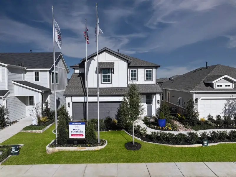 Front exterior of a home in the The Meadows community, located in Denton, TX (Image 4).
