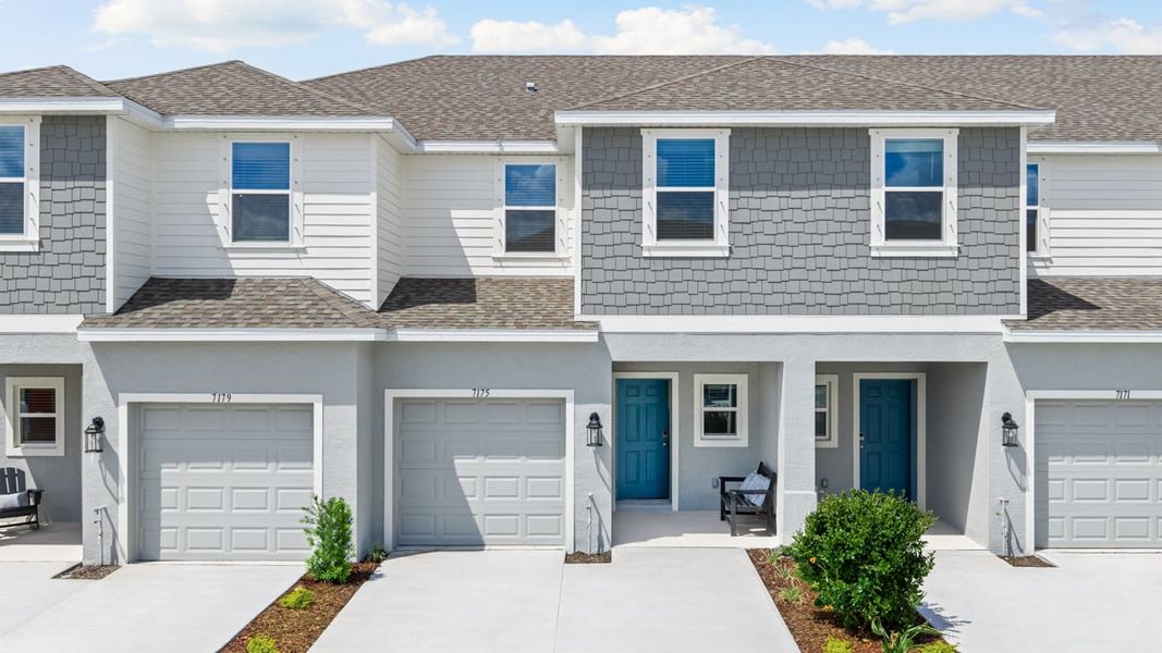 Front exterior of a home in the The Towns at Tiburon community, located in Nokomis, FL (Image 5).