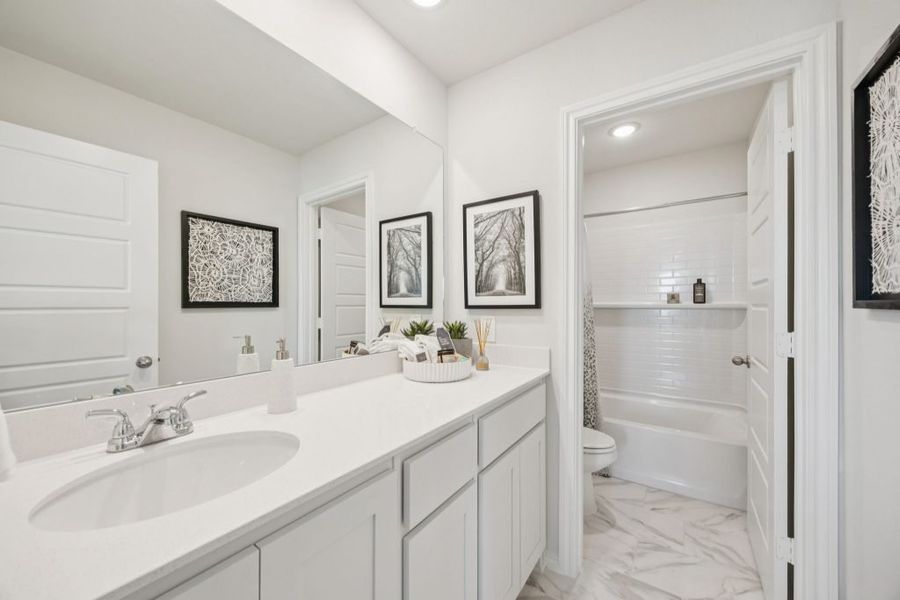 Furnished interior in a model home at Churchill in Anna (Image 23).