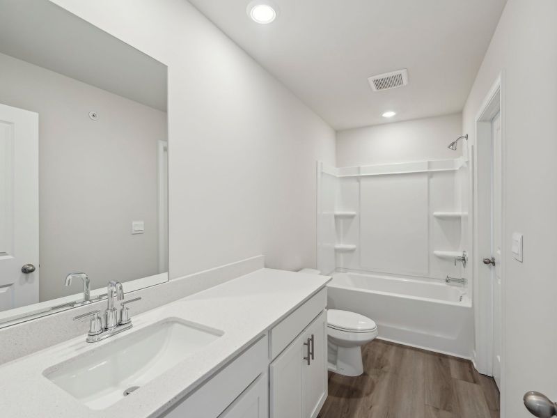 Furnished interior in a model home at Brooks Lake in Loganville (Image 7).
