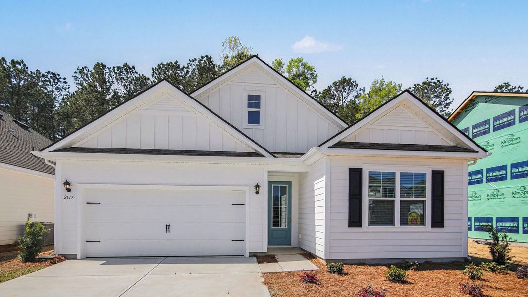 Front exterior of a home in the Chapman Village community, located in Conway, SC (Image 11). Front exterior of a home in the Chapman Village community, located in Conway, SC (Image 11).