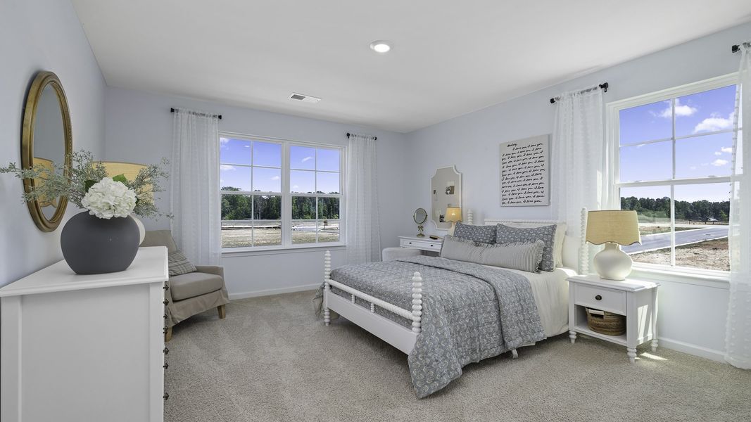 Furnished interior in a model home at The Preserve at Kinsley in Jamestown (Image 15).