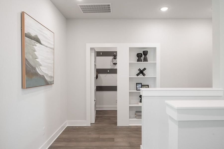 Furnished interior in a model home at Sienna 60’ in Missouri City (Image 27).