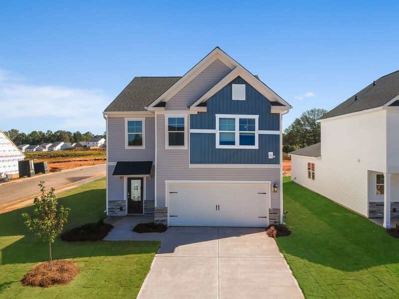 Front exterior of a home in the Persimmon Hill community, located in Lyman, SC (Image 2). Front exterior of a home in the Persimmon Hill community, located in Lyman, SC (Image 2).
