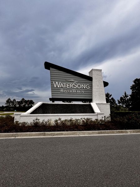 Elegant entrance sign in RiverTown - WaterSong by Mattamy Homes, St. Johns, FL, with a sleek architectural design. Elegant entrance sign in RiverTown - WaterSong by Mattamy Homes, St. Johns, FL, with a sleek architectural design.