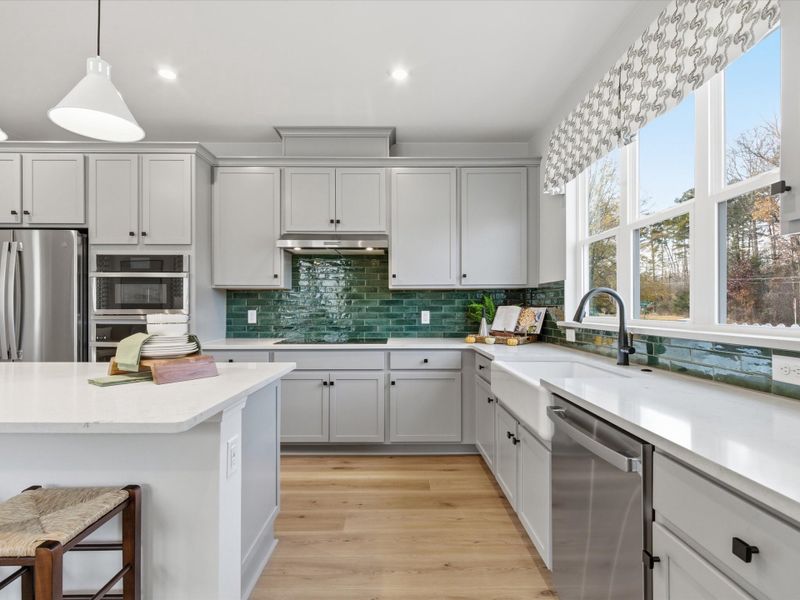 Furnished interior in a model home at Ellis Townes in Charlotte (Image 6).