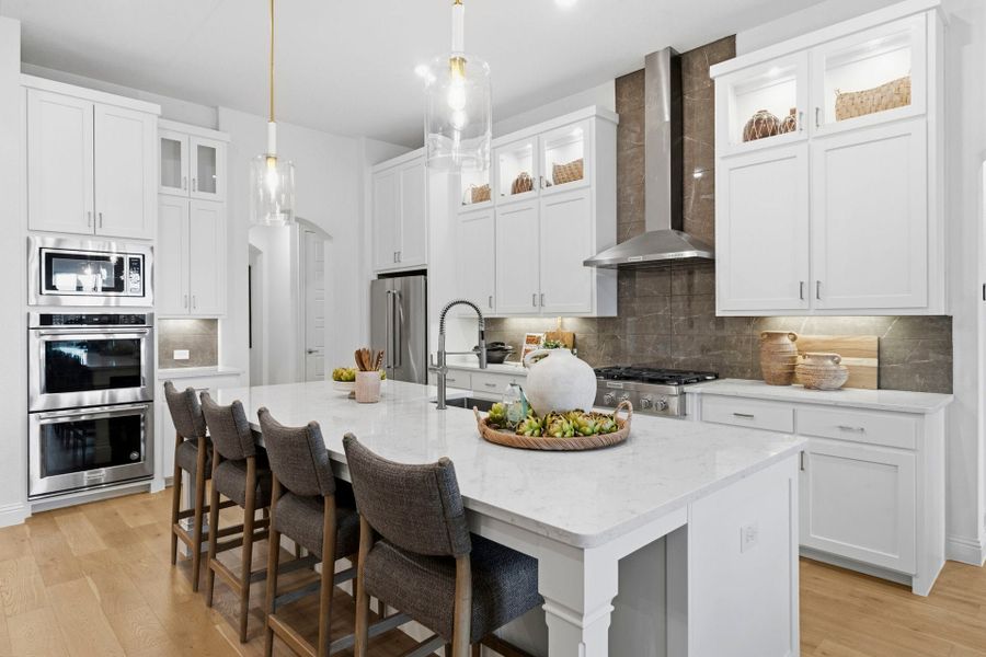 Furnished interior in a model home at Mustang Lakes in McKinney (Image 18).