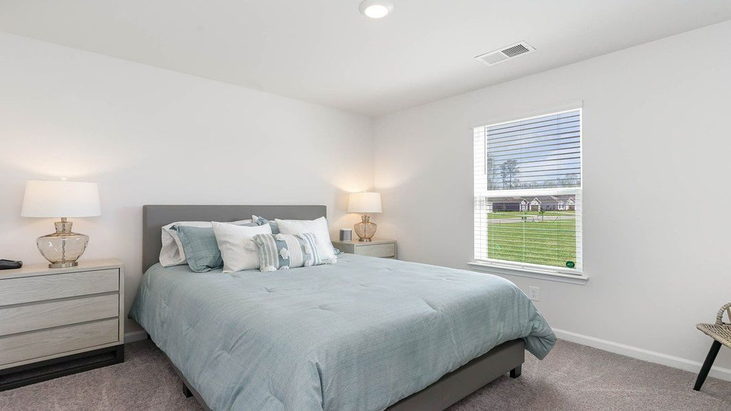 Furnished interior in a model home at Sandpiper Place in Myrtle Beach (Image 5).