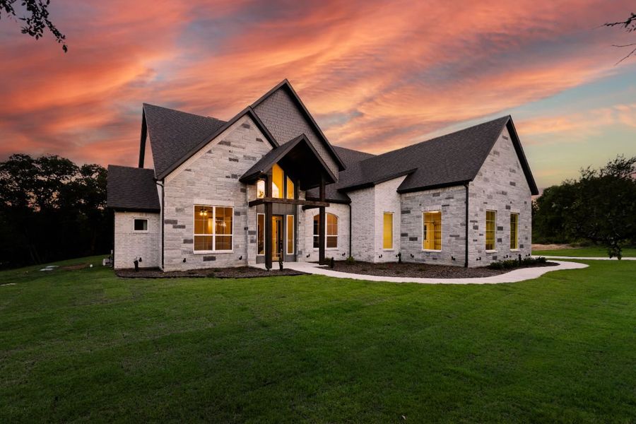 Front exterior of a home in the Lola Creek Ranch community, located in Boyd, TX (Image 16).