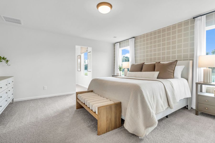 Furnished interior in a model home at Reeves Crossing in St. George (Image 14).