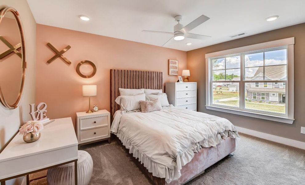 Furnished interior in a model home at Twin Creek Forsyth in Kernersville (Image 37).