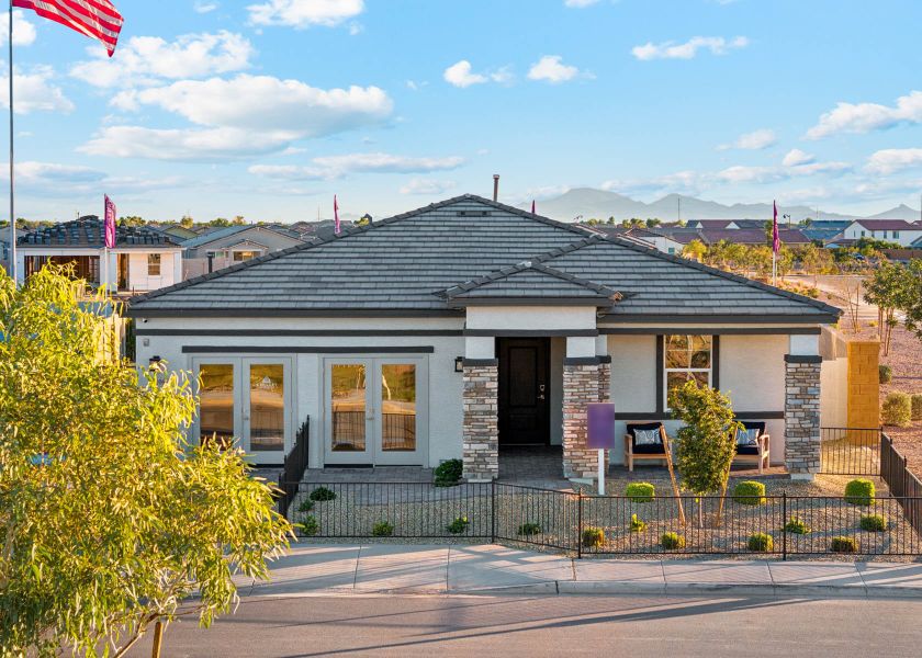 A house with a fence around it.