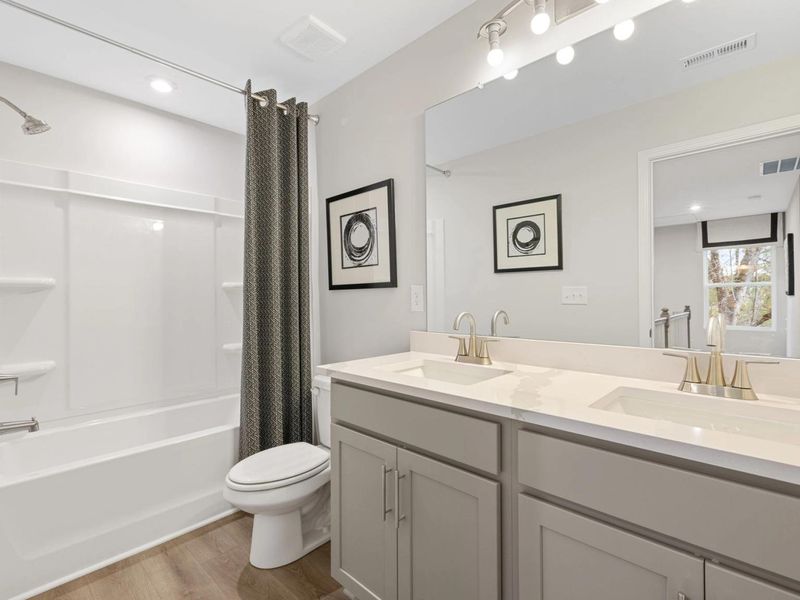 Furnished interior in a model home at Lake Shore in Winder (Image 18).