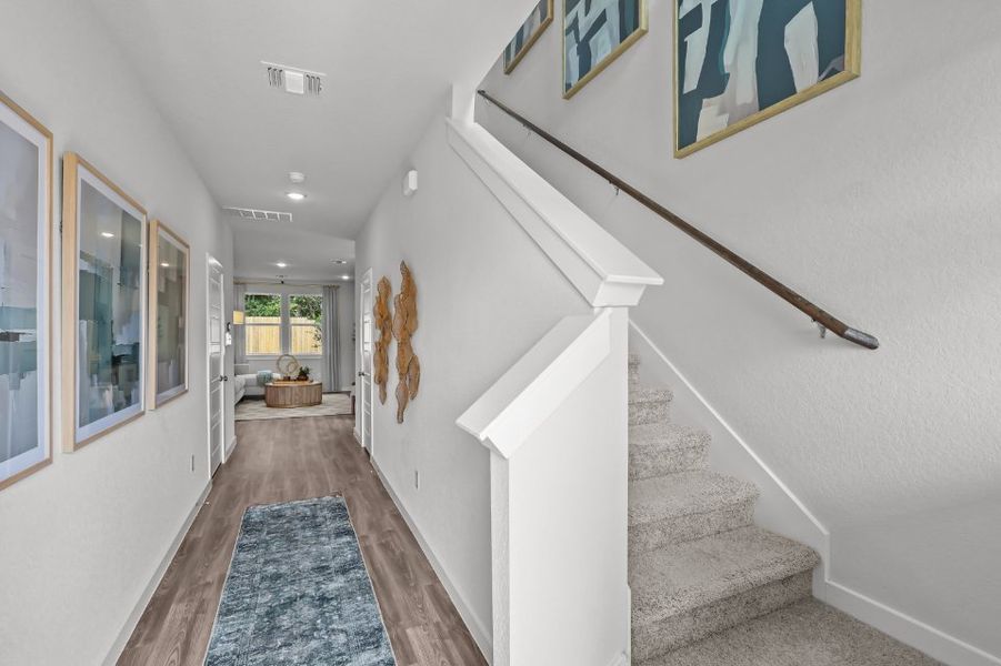 A staircase in a house. A staircase in a house.