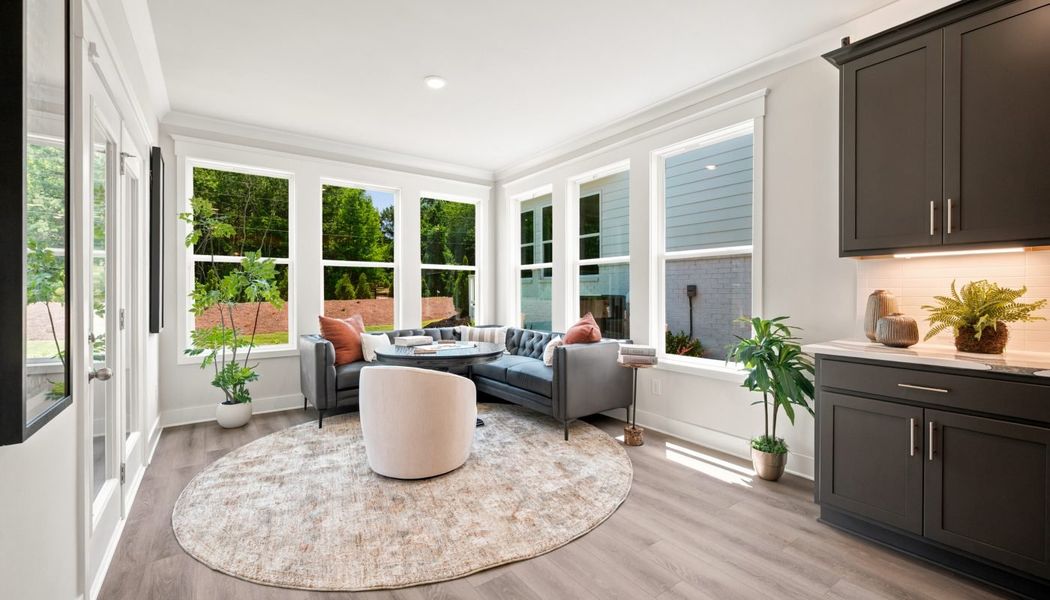 Furnished interior in a model home at Fowler Farms in Auburn (Image 114).