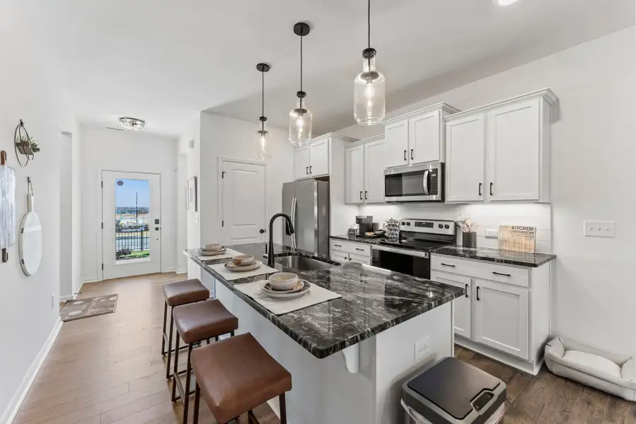 Furnished interior in a model home at Meadowview TH in Pittsboro (Image 2).