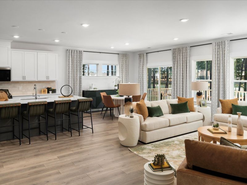 Furnished interior in a model home at The Coves at Lakes of Cane Bay in Summerville (Image 11). Furnished interior in a model home at The Coves at Lakes of Cane Bay in Summerville (Image 11).