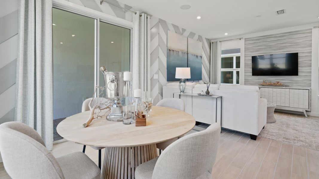 Trinity Place Staged Model Ambersweet Dining Area by DRB Homes in Saint Cloud FL Trinity Place Staged Model Ambersweet Dining Area by DRB Homes in Saint Cloud FL