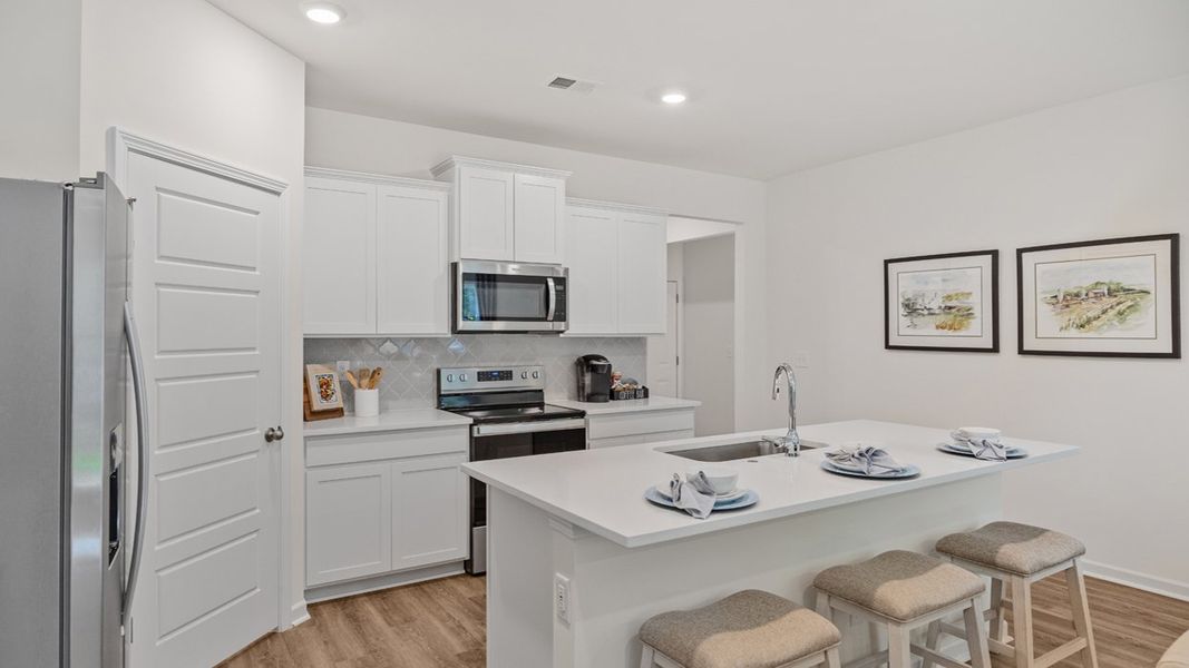 Furnished interior in a model home at Cottages at Blue Ridge in Bonaire (Image 11).