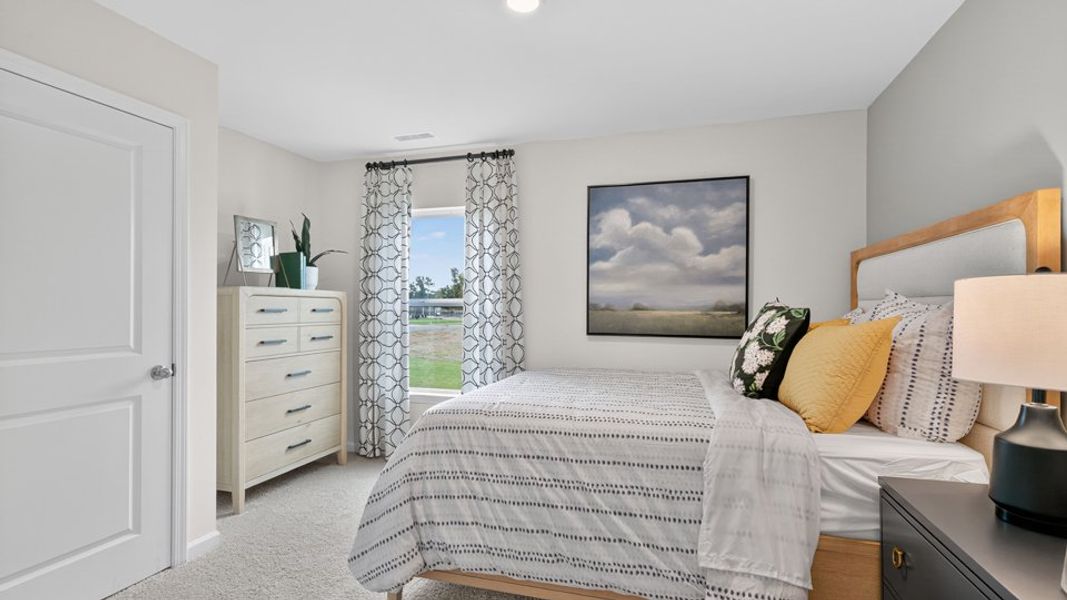 Furnished interior in a model home at Belle Grove in Wendell (Image 27).