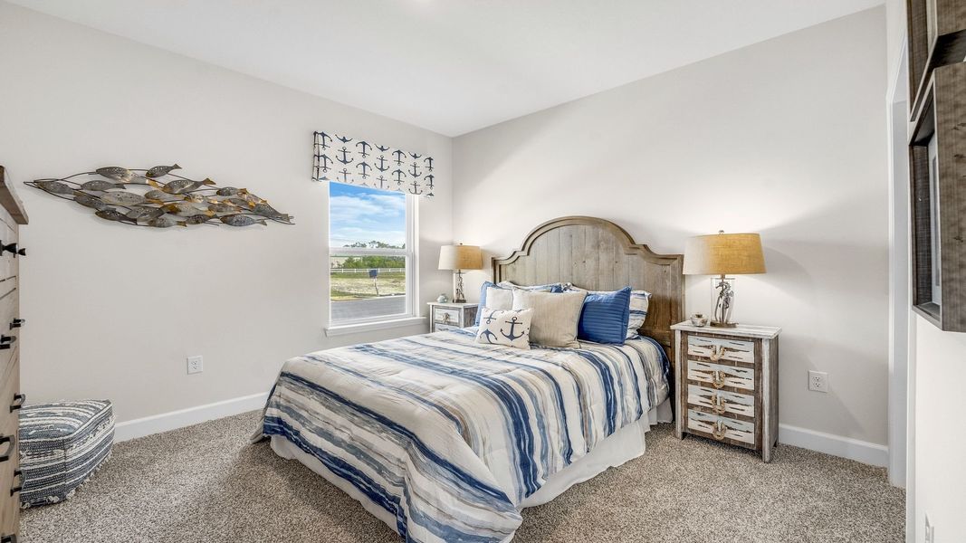 Furnished interior in a model home at Hodges Bayou Plantation in Panama City (Image 7).