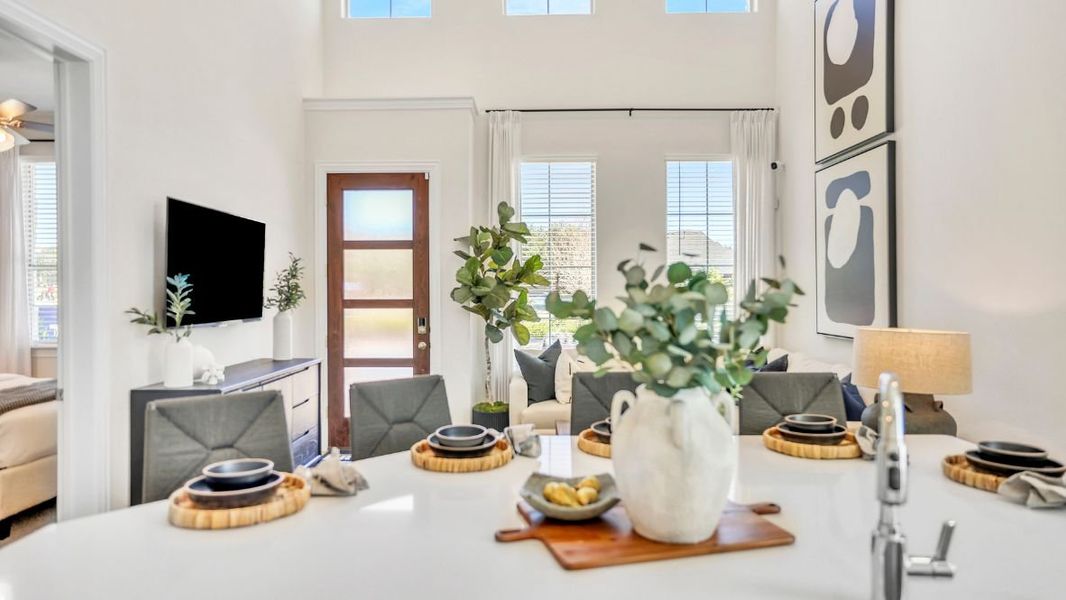 Furnished interior in a model home at The Avenue in Allen (Image 7).