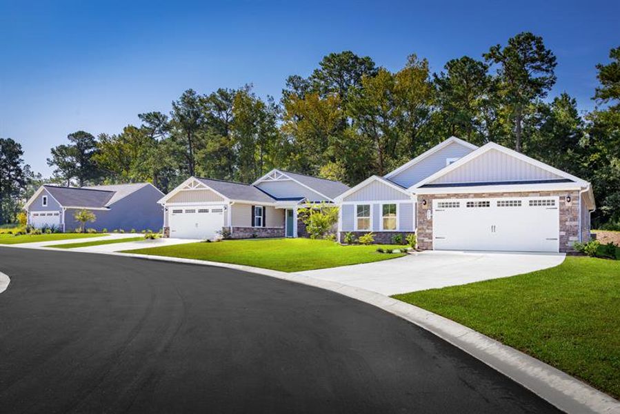 Front exterior of a home in the Middle Creek Village Ranches community, located in Bolivia, NC (Image 4). Front exterior of a home in the Middle Creek Village Ranches community, located in Bolivia, NC (Image 4).