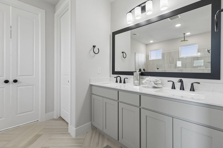Furnished interior in a model home at Ten Mile Creek in DeSoto (Image 16).