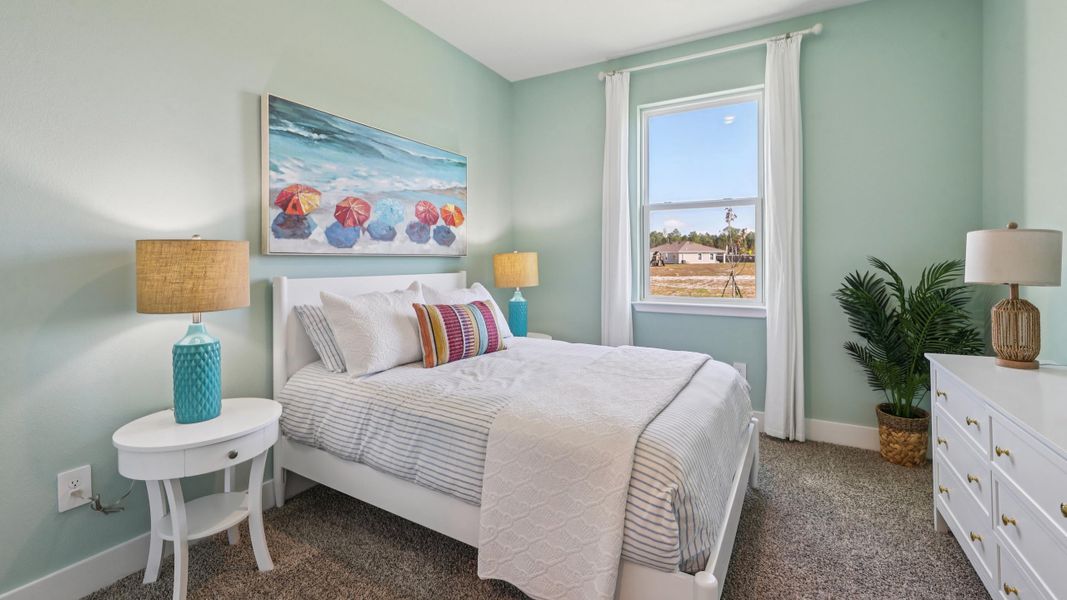 Furnished interior in a model home at Tartan Farms at Winding Oaks in Ocala (Image 16).