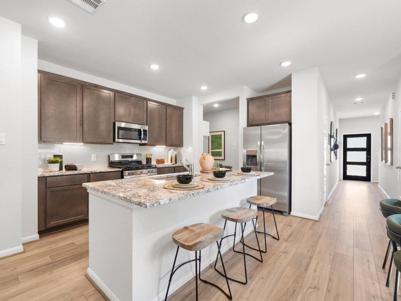 Furnished interior in a model home at Caney Creek Place in Conroe (Image 14).
