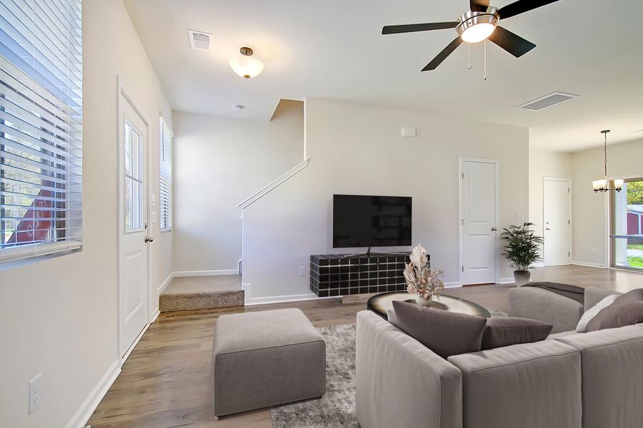 Furnished interior in a model home at Founder's Park in Summerville (Image 5).