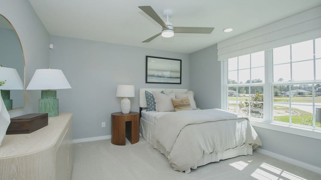 Experience serene elegance with expansive windows and chic décor in Cielo community's luxury home.